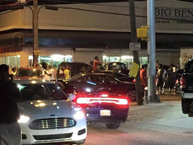 Protesters on July 5, 2016 at scene outside Baton Rouge, Louisiana convenience store of fatal confrontation between two police officers and suspect 