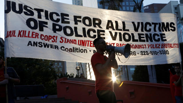 ​A man speaks at a rally against police violence in Los Angeles, California, on July 13, 2016. 