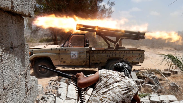 Libyan forces allied with the U.N.-backed government fire weapons during a battle with ISIS fighters in Sirte, Libya, July 21, 2016. 