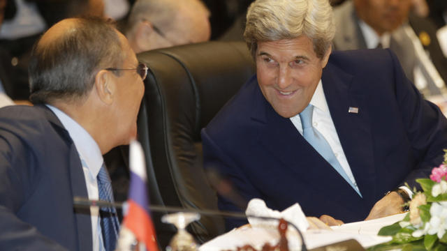 Russia's Foreign Minister Sergey Lavrov, left, talks with U.S. Secretary of State John Kerry during the 6th East Asia Summit Foreign Minister's meeting in Vientiane, Laos, Tuesday, July 26, 2016. 