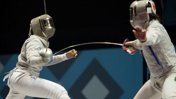 Angelica Aguilar (R) of Mexico competes 
