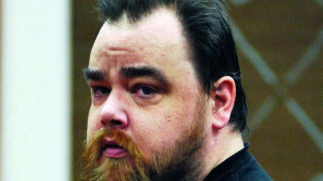 Walter Richters stands during his arraignment at Caledonia County Court in St. Johnsbury, Vt., Oct. 8, 2014. 