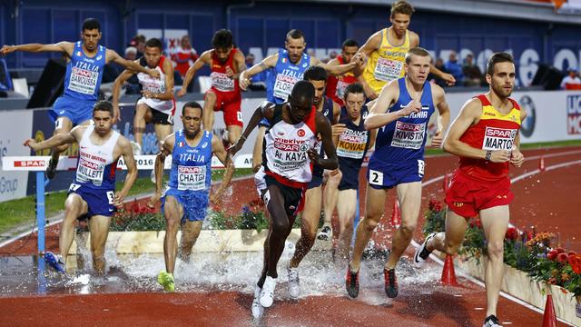 Athletes compete in the men's 3000m steeplechase final for the European championships in Amsterdam July 8, 2016. 