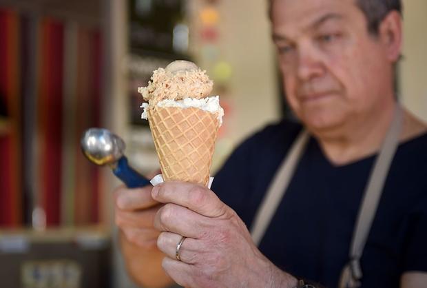 A man serves ice cream 