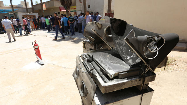 Burnt incubators stand outside Yarmuk hospital in west Baghdad 