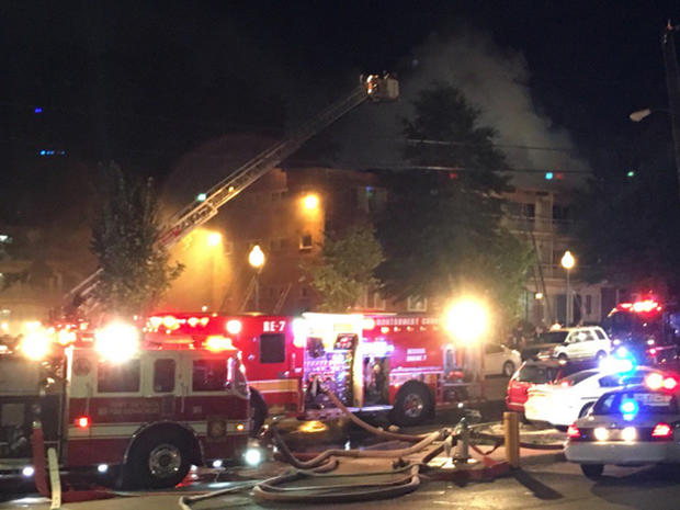​Fire crew battle apartment building blaze in Silver Spring, Maryland on August 11, 2016 