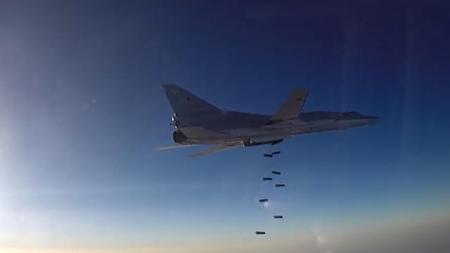 ​A Russian Tu-22M3 bomber conducts and airstrike over Syria after taking off from an airbase near Hamedan, Iran, in an image from video released by the Russian Ministry of Defense 