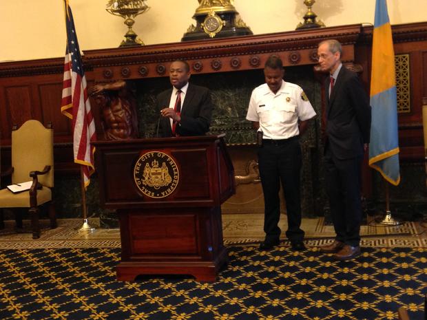 Arthur Evans at the podium, Laster in white and Health Commissioner Thomas Farley at right 