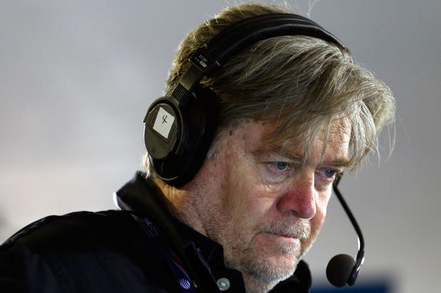 Stephen K. Bannon looks at his computer to see who will be the next caller he will talk to while hosting Brietbart News Daily on SiriusXM Patriot at Quicken Loans Arena on July 20, 2016, in Cleveland, Ohio. 