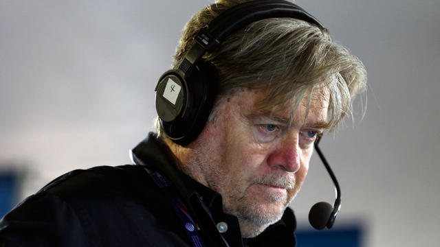 Stephen K. Bannon looks at his computer to see who will be the next caller he will talk to while hosting Brietbart News Daily on SiriusXM Patriot at Quicken Loans Arena on July 20, 2016, in Cleveland, Ohio. 