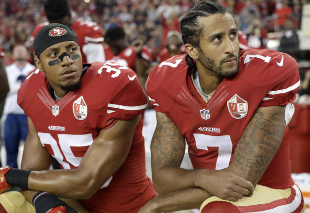 Colin Kaepernick kneels for national anthem amid USA chants