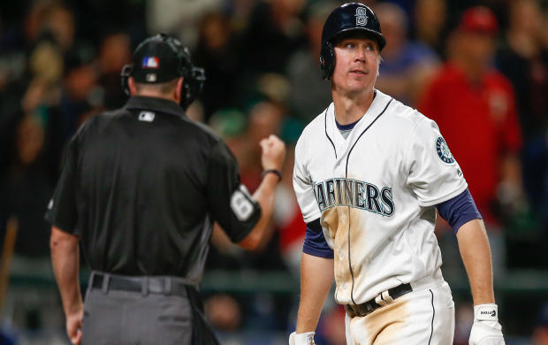 Steve Clevenger, No. 32 of the Seattle Mariners, heads back to the dugout after striking out with two runners on base to end the fifth inning against the Minnesota Twins at Safeco Field on May 28, 2016, in Seattle, Washington. 