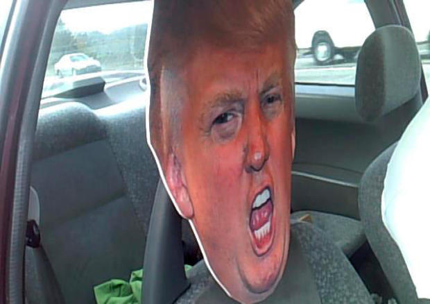 A cardboard cutout of Republican presidential nominee Donald Trump’s head is attached to the passenger seat of a car Sept. 27, 2016, in Auburn, Washington, in this photo provided by the Washington State Patrol. 