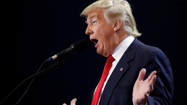 Republican presidential nominee Donald Trump rallies with supporters at Orlando Melbourne International Airport in Melbourne, Florida, Sept. 27, 2016. 