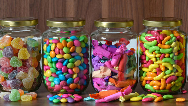 Various sugary candy in a glass jar 