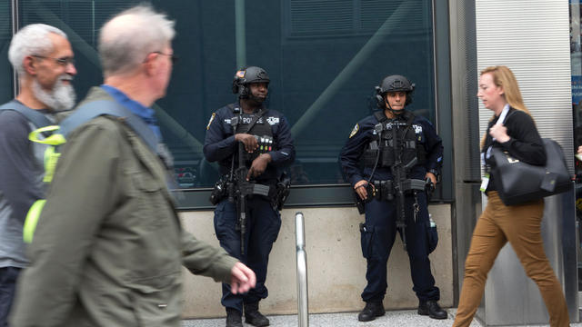 New York City police officers patrol the front of the Jacob Javits Convention Center Nov. 3, 2016, in New York. 