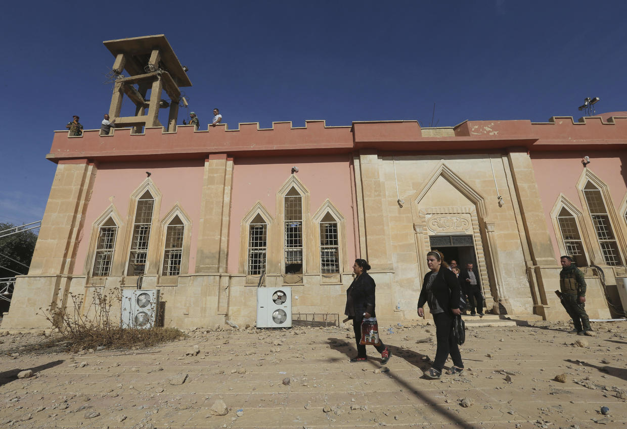 Gasps Tears As Group Of Iraqi Christians Return To Isis Destroyed Parish Cbs News