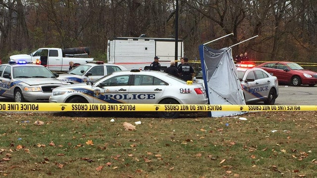 Crews work the scene after a shooting at a park in Louisville, Kentucky, on Nov. 24, 2016. 