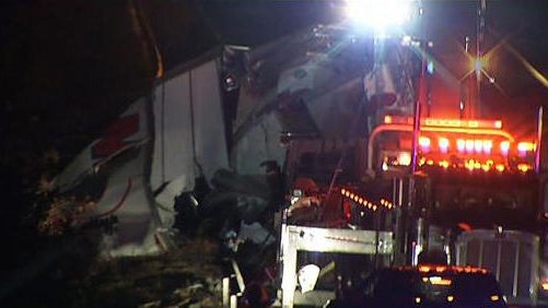 Crews work the scene after a tractor-trailer struck and killed a woman on Interstate 95 in Old Lyme, Connecticut, on Dec. 1, 2016. 