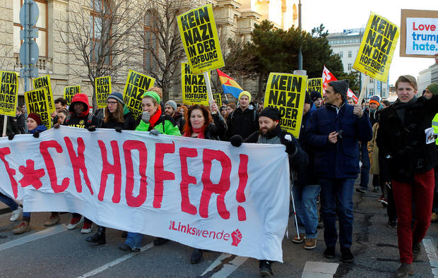 Protesters holding posters that read “No Nazi inside Hofburg palace” demonstrate against Austrian presidential candidate Norbert Hofer in Vienna, Austria, Dec. 3, 2016. 