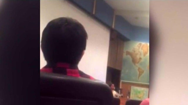 Orange Coast College professor Olga Perez Stable Cox speaks to her class in Costa Mesa, California, in this image capture of a cellphone video. 