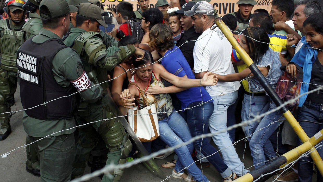 Riots Looting In Venezuela Over President Maduros Sudden Currency Manipulation Cbs News 1149