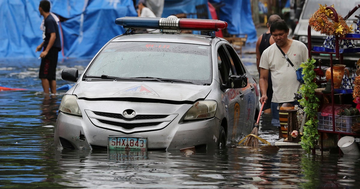 Powerful typhoon slams into eastern Philippines on Christmas Day - CBS News