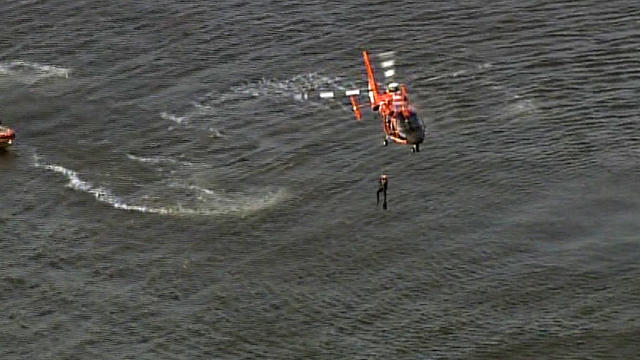 Crews respond after an Apache helicopter on a routine training mission for the Texas Army National Guard crashed in Galveston Bay just off the Texas shoreline on Dec. 28, 2016. 