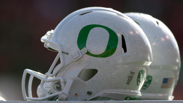 Isolated view of Oregon Ducks helmets on the sideline during the Ducks game against the Utah Utes at Rice-Eccles Stadium on Nov. 19, 2016, in Salt Lake City, Utah. 