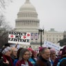 Demonstrators march past the U.S. Capitol during the Women’s March on Washington in Washington Jan. 21, 2017. 