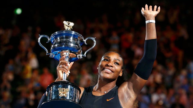 Serena Williams of the U.S. holds her trophy after winning her women&rsquo;s singles final match against Venus Williams of the U.S. in the Australian Open at Melbourne Park in Melbourne, Australia, Jan. 28, 2017. 