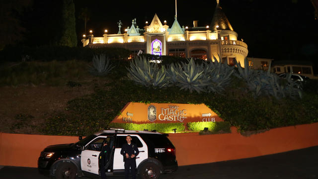 Los Angeles Police Department officers control the entrance at the Magic Castle magicians’ club in the Hollywood neighborhood of Los Angeles, California, Feb. 24, 2017. 