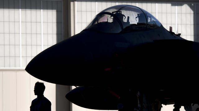 A U.S. Air Force F-15 fighter jet is parked during the inaugural Trilateral Exercise between the U.S. Air Force, United Kingdom’s Royal Air Force and the French Air Force at Joint Base Langley-Eustis in Hampton, Virginia, Dec. 15, 2015. 