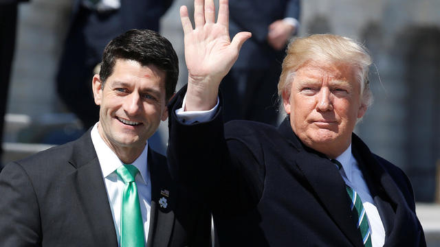 President Trump waves with House Speaker Paul Ryan, R-Wisconsin, after attending a Friends of Ireland reception on Capitol Hill in Washington March 16, 2017. 