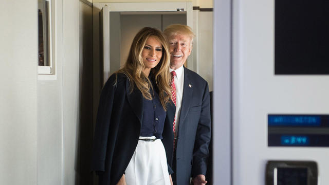 President Trump speaks to the press with first lady Melania Trump during a Feb. 10, 2017, flight on Air Force One bound for the president’s Mar-a-Lago resort in Florida with Japanese Prime Minister Shinzo Abe and his wife Akie Abe. 