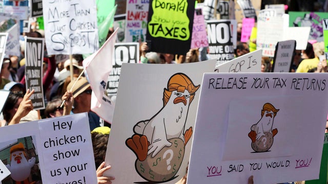 tax-day-marches-ap-17105796799953.jpg 