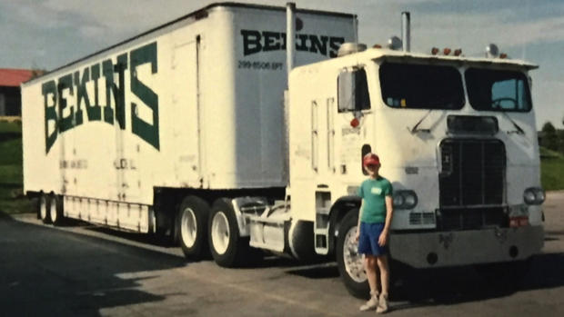 Young Tim Holmberg with his father's moving truck 