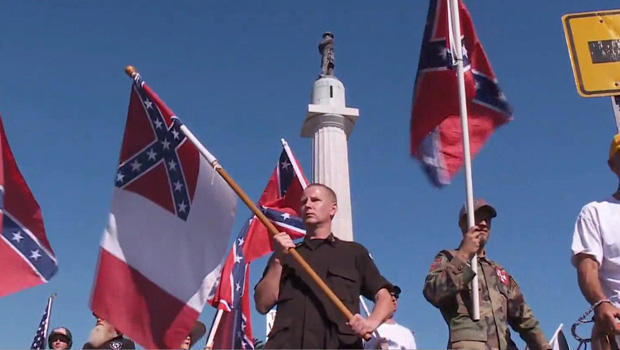 nola-confederate-statue-protest-rebel-flags-620.jpg 