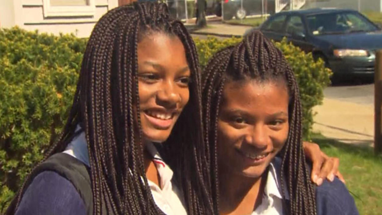 Twin sisters Deanna and Mya Scott, 15, were punished because the school's dress code says braid extensions aren't allowed.