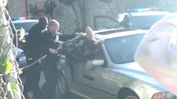 Oakland police pull over car after Gorilla tape stunt 