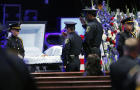 Law enforcement pay respects during a viewing before the funeral service for Dallas Police Senior Cpl. Lorne Ahrens held at Prestonwood Baptist Church on July 13, 2016, in Plano, Texas. 