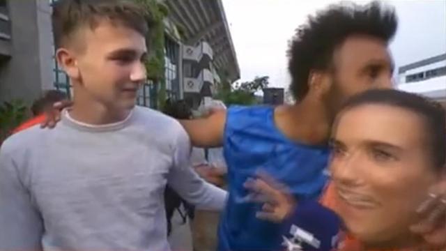 French Open qualifier Maxime Hamou kisses Eurosport TV's Maly Thomas during a live interview in Paris on May 29, 2017, in this screen capture taken from video. 