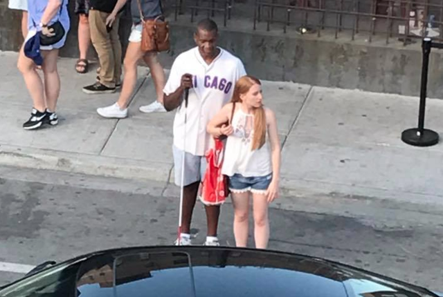 Woman's act of kindness for blind Chicago Cubs fan goes viral - CBS News
