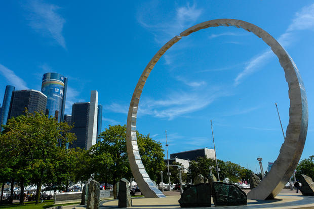 Transcending monument at Hart Plaza with Rencen in Detroit, USA 