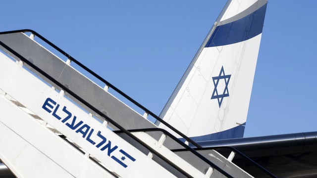 A picture taken on July 19, 2016, shows the tail of an El Al Israel Airlines' Boeing 777-258 on the tarmac at Ben Gurion International Airport near Tel Aviv. 
