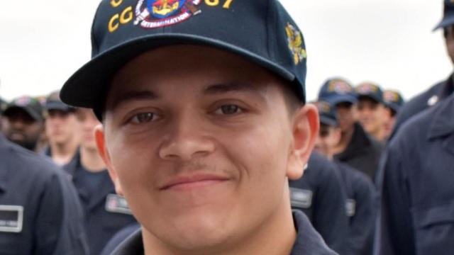 Peter Mims poses for a photo after being frocked to the rank of petty officer third class during a ceremony aboard the USS Shiloh May 25, 2017. 