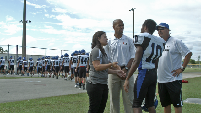 second-from-left-ray-crittenden-program-coordinator-ccchsp-speaks-with-high-school-athlete.png 