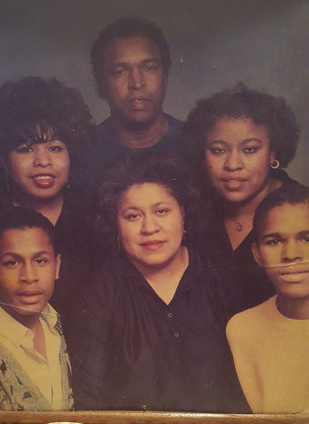 Nevest Coleman - with family, Nevest is bottom left, deceased parents in middle 