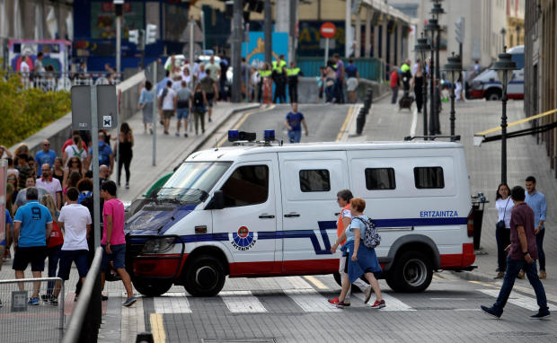 A police van blocks the the street at the beginning of fiestas in Bilbao 