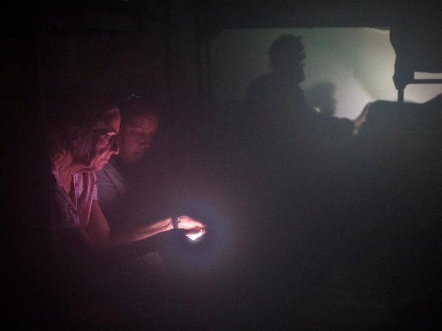 Women seek shelter at the Good Samaritan Rescue Mission during Hurricane Harvey in Corpus Christi, Texas 